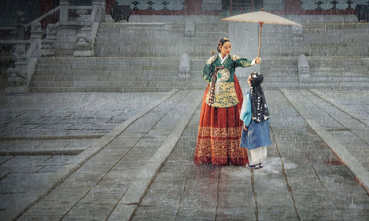 header image for Under the Queen's Umbrella