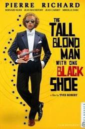 The Tall Blond Man with One Black Shoe