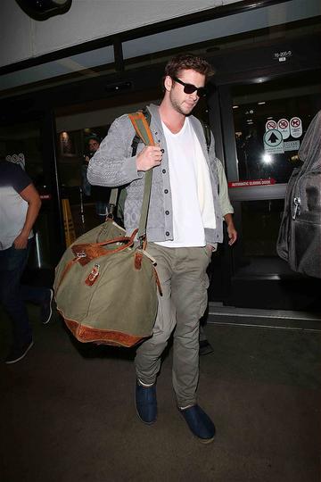 What are they wearing? Celebs at the airport: Lady Gaga, Jessica Alba, Liam Hemsworth &amp; more