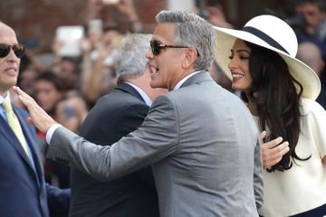 George Clooney and Amal Alamuddin after their marriage civil ceremony in Venice
