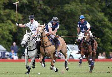 Prince George of Cambridge with Catherine, Duchess of Cambridge at the Gigaset Charity Polo Match at Beaufort Polo Club