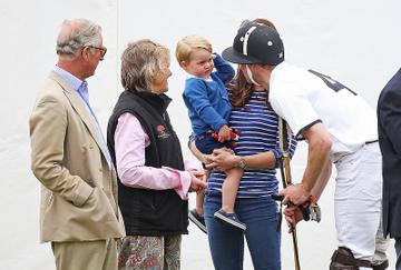Prince George of Cambridge with Catherine, Duchess of Cambridge at the Gigaset Charity Polo Match at Beaufort Polo Club