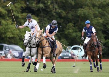 Prince George of Cambridge with Catherine, Duchess of Cambridge at the Gigaset Charity Polo Match at Beaufort Polo Club
