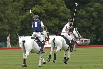 Prince George of Cambridge with Catherine, Duchess of Cambridge at the Gigaset Charity Polo Match at Beaufort Polo Club