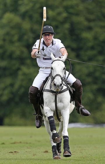 Prince George of Cambridge with Catherine, Duchess of Cambridge at the Gigaset Charity Polo Match at Beaufort Polo Club
