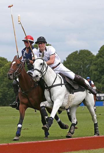 Prince George of Cambridge with Catherine, Duchess of Cambridge at the Gigaset Charity Polo Match at Beaufort Polo Club