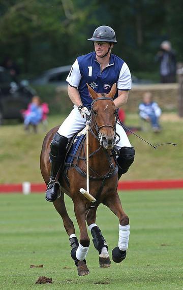 Prince George of Cambridge with Catherine, Duchess of Cambridge at the Gigaset Charity Polo Match at Beaufort Polo Club