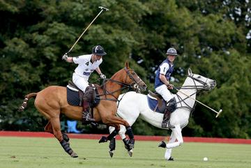 Prince George of Cambridge with Catherine, Duchess of Cambridge at the Gigaset Charity Polo Match at Beaufort Polo Club