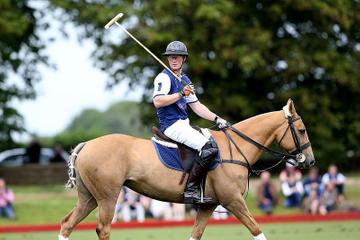 Prince George of Cambridge with Catherine, Duchess of Cambridge at the Gigaset Charity Polo Match at Beaufort Polo Club