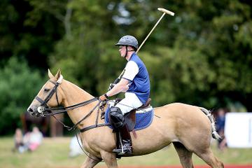 Prince George of Cambridge with Catherine, Duchess of Cambridge at the Gigaset Charity Polo Match at Beaufort Polo Club