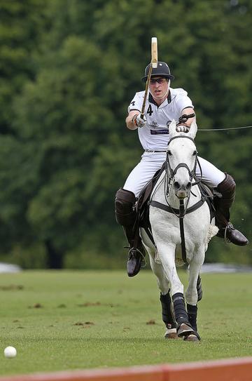 Prince George of Cambridge with Catherine, Duchess of Cambridge at the Gigaset Charity Polo Match at Beaufort Polo Club