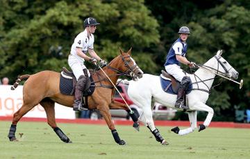 Prince George of Cambridge with Catherine, Duchess of Cambridge at the Gigaset Charity Polo Match at Beaufort Polo Club