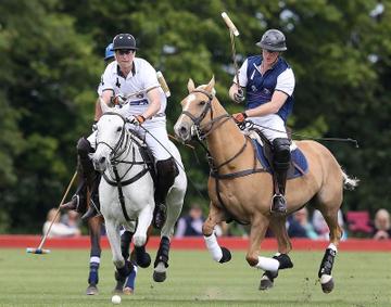 Prince George of Cambridge with Catherine, Duchess of Cambridge at the Gigaset Charity Polo Match at Beaufort Polo Club
