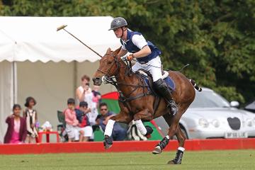 Prince George of Cambridge with Catherine, Duchess of Cambridge at the Gigaset Charity Polo Match at Beaufort Polo Club