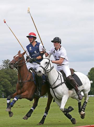 Prince George of Cambridge with Catherine, Duchess of Cambridge at the Gigaset Charity Polo Match at Beaufort Polo Club