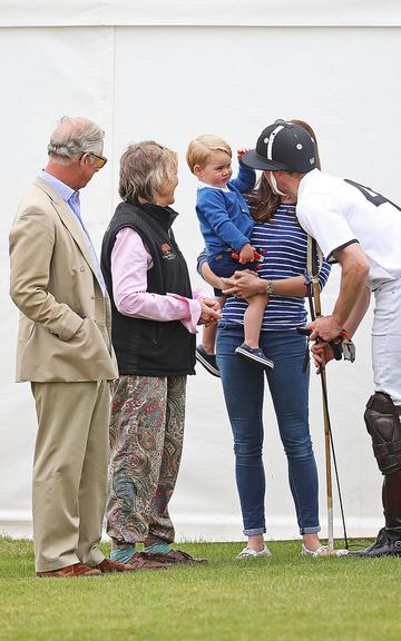 Prince George of Cambridge with Catherine, Duchess of Cambridge at the Gigaset Charity Polo Match at Beaufort Polo Club