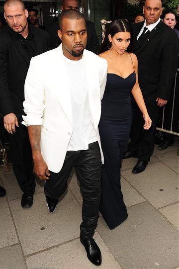 Kanye West and Kim Kardashian leaving their hotel