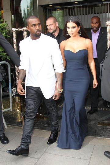 Kanye West and Kim Kardashian leaving their hotel