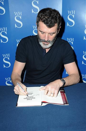 Roy Keane signs copies of his book in Manchester