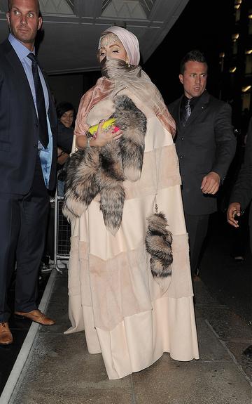 Lady Gaga struts in Philip Treacy at LFW