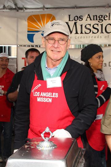Celebrities help out at Los Angeles Mission Christmas Eve For The Homeless