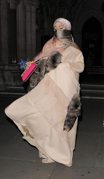 Lady Gaga struts in Philip Treacy at LFW