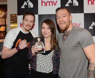 Conor McGregor signs copies of his DVD documentary 'Notorious' at HMV