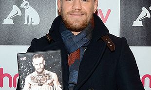Conor McGregor signs copies of his DVD documentary 'Notorious' at HMV