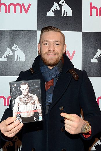 Conor McGregor signs copies of his DVD documentary 'Notorious' at HMV
