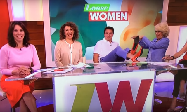 Watch: John Barrowman snots himself while trying to show off his heels on 'Loose Women'