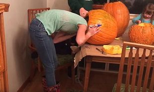 Watch: Girl gets her head stuck inside pumpkin as family do the right thing and laugh at her
