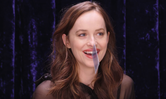 Watch: Dakota Johnson shows what she can stick between the gap in her front teeth because why not