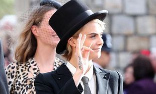 Cara Delevigne breaks tradition by wearing a power suit to Princess Eugenie's wedding Cara Delevigne breaks tradition by wearing a power suit to Princess Eugenie's wedding