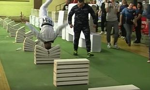 Watch: 16-year-old breaks world record by smashing 111 concrete blocks in a row with his head Watch: 16-year-old breaks world record by smashing 111 concrete blocks in a row with his head
