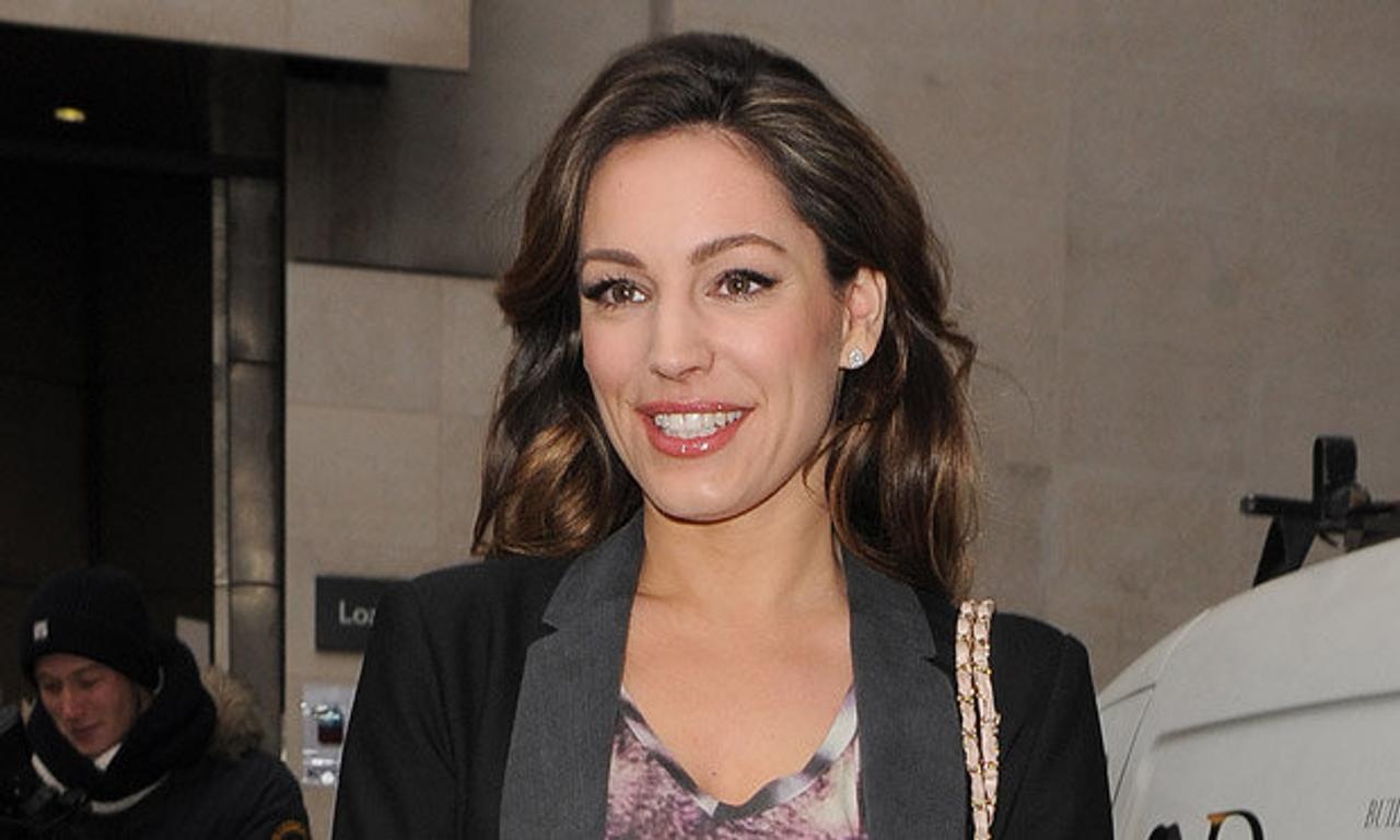 Kelly Brook posts pic of her getting spanked