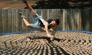 Watch: Bless this brave soul that dived into 1,000 mouse traps so we could watch it in slo-mo