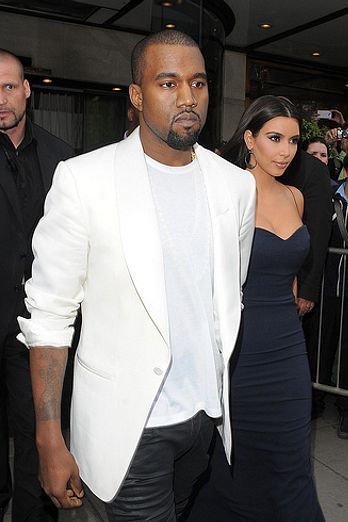 Kanye West and Kim Kardashian leaving their hotel