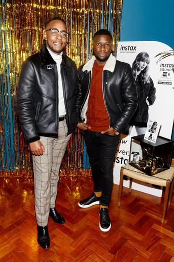 Lawson Mpame and Itchey Drew pictured at the instax Christmas party that showcased the perfect selection of must-have gifts. Picture Andres Poveda