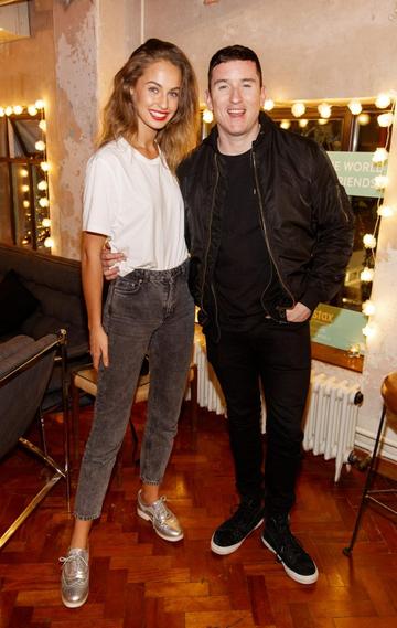 Thalia Heffernan and Evan Doherty pictured at the instax Christmas party that showcased the perfect selection of must-have gifts. Picture Andres Poveda