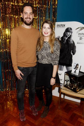 Kevin Meighan and Hannah Popham pictured at the instax Christmas party that showcased the perfect selection of must-have gifts. Picture Andres Poveda