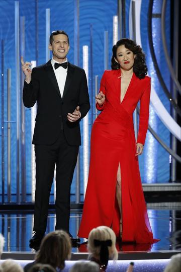 Hosts Andy Samberg and Sandra Oh  speak onstage during the 76th Annual Golden Globe Awards at The Beverly Hilton Hotel on January 06, 2019 in Beverly Hills, California.  (Photo by Paul Drinkwater/NBCUniversal via Getty Images)