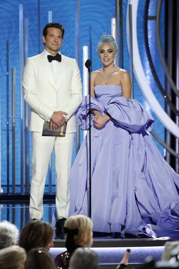 Presenters  Bradley Cooper and Lady Gaga  speak onstage during the 76th Annual Golden Globe Awards at The Beverly Hilton Hotel on January 06, 2019 in Beverly Hills, California.  (Photo by Paul Drinkwater/NBCUniversal via Getty Images)