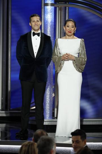 Hosts Andy Samberg and Sandra Oh speak onstage during the 76th Annual Golden Globe Awards at The Beverly Hilton Hotel on January 06, 2019 in Beverly Hills, California.  (Photo by Paul Drinkwater/NBCUniversal via Getty Images)