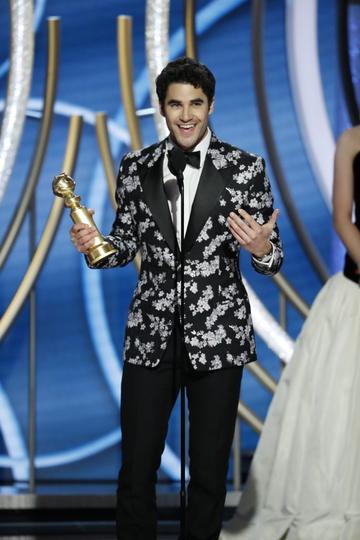 Darren Criss from “The Assassination of Gianni Versace: American Crime Story” accepts the Best Performance by an Actor in a Limited Series or Motion Picture Made for Television award onstage during the 76th Annual Golden Globe Awards at The Beverly Hilton Hotel on January 06, 2019 in Beverly Hills, California.  (Photo by Paul Drinkwater/NBCUniversal via Getty Images)