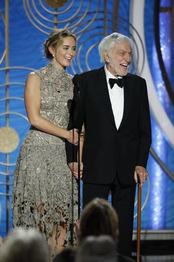 Presenters Emily Blunt and Dick Van Dyke  speak onstage during the 76th Annual Golden Globe Awards at The Beverly Hilton Hotel on January 06, 2019 in Beverly Hills, California.  (Photo by Paul Drinkwater/NBCUniversal via Getty Images)