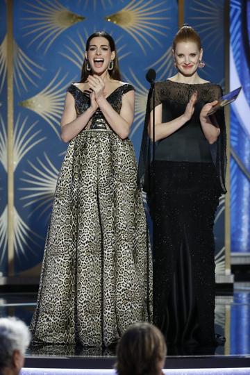 Presenters Anne Hathaway and Jessica Chastain  speak onstage during the 76th Annual Golden Globe Awards at The Beverly Hilton Hotel on January 06, 2019 in Beverly Hills, California.  (Photo by Paul Drinkwater/NBCUniversal via Getty Images)
