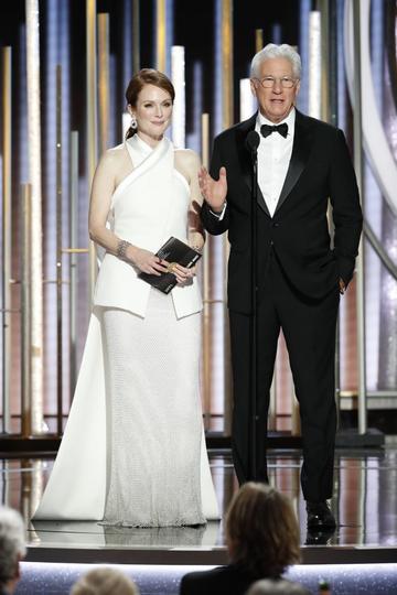 Julianne Moore and Richard Gere 
 speak onstage during the 76th Annual Golden Globe Awards at The Beverly Hilton Hotel on January 06, 2019 in Beverly Hills, California.  (Photo by Paul Drinkwater/NBCUniversal via Getty Images)