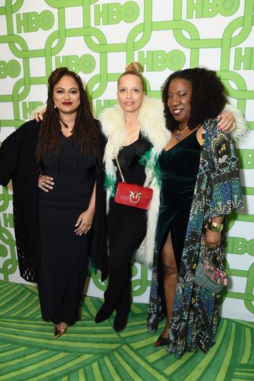 Ava DuVernay, a guest, and Tarana Burke attend HBO's Official Golden Globe Awards After Party at Circa 55 Restaurant on January 6, 2019 in Los Angeles, California.  (Photo by Presley Ann/Getty Images)