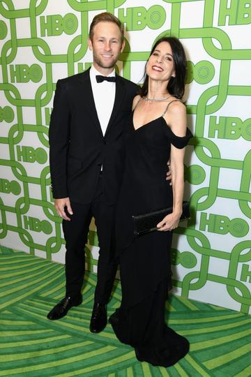 Aaron Endress-Fox (L) and Perrey Reeves attend HBO's Official Golden Globe Awards After Party at Circa 55 Restaurant on January 6, 2019 in Los Angeles, California.  (Photo by Presley Ann/Getty Images)