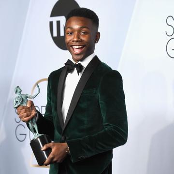 LOS ANGELES, CA - JANUARY 27:  Niles Fitch, winner of Outstanding Performance by an Ensemble in a Drama Series for 'This Is Us,' poses in the press room during the 25th Annual Screen Actors Guild Awards at The Shrine Auditorium on January 27, 2019 in Los Angeles, California.  (Photo by Frazer Harrison/Getty Images)